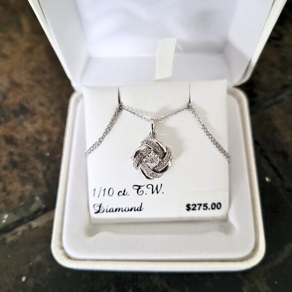 Sterling Silver 1/10 Carat T.W. Diamond Knot Pendant Necklace - Picture 1 of 7